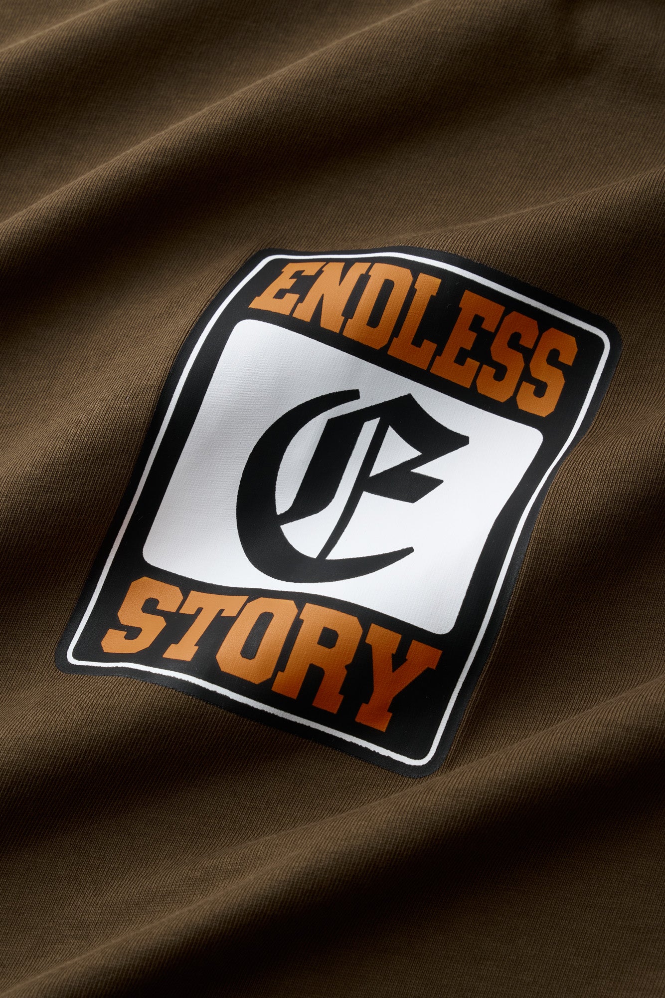 LOCKED IN TEE - BROWN